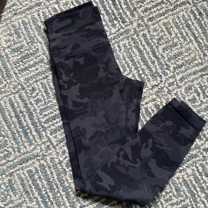 Black and grey camo print leggings. Great condition!